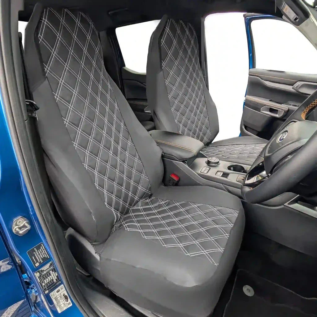 Front seat covers, gray faux leather look with diamond stitch on seat and headrest areas