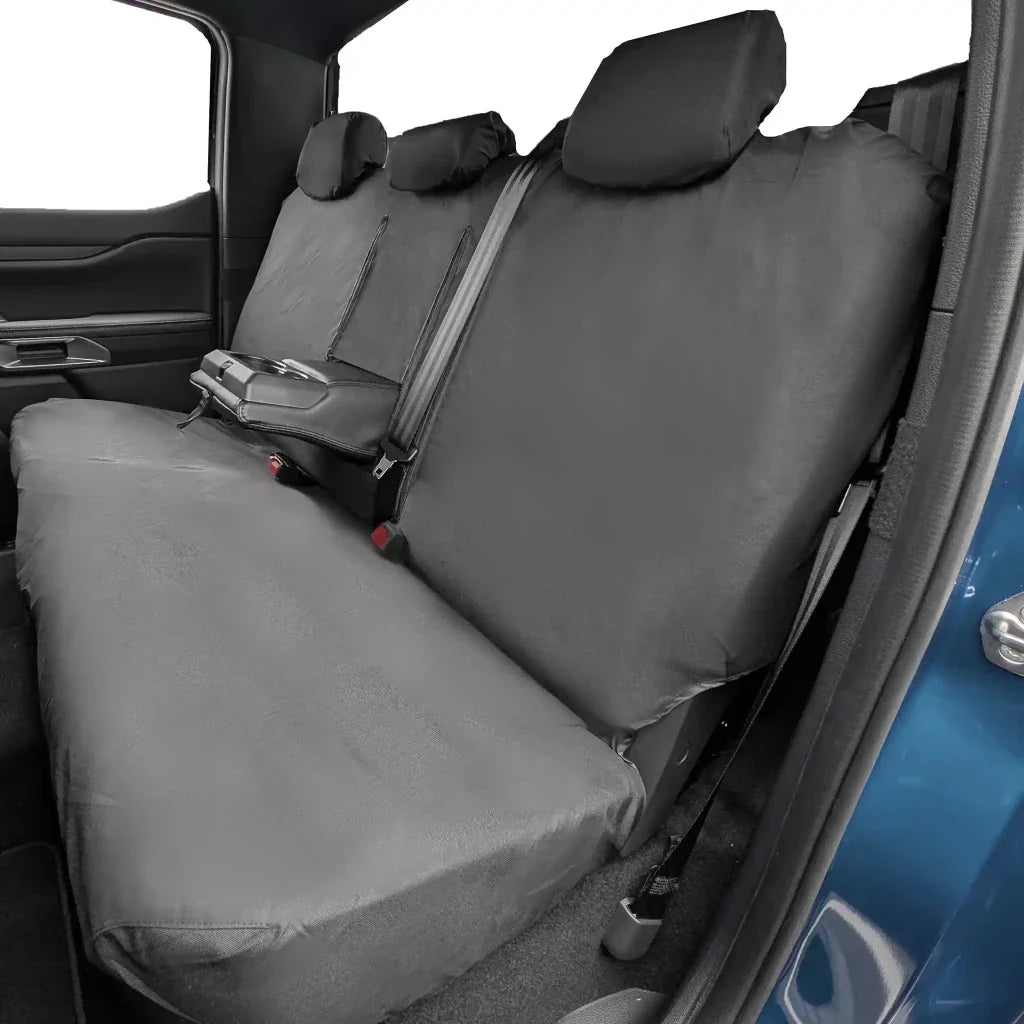 Rear seat cover set with dark gray base, seatbacks, and visible seatbelt openings