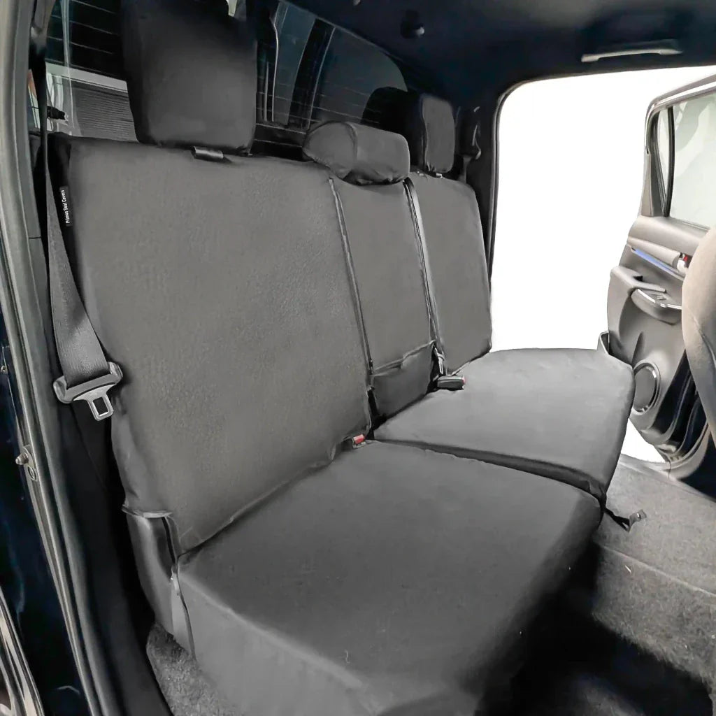Rear seat cover set with gray padded panels and headrest covers