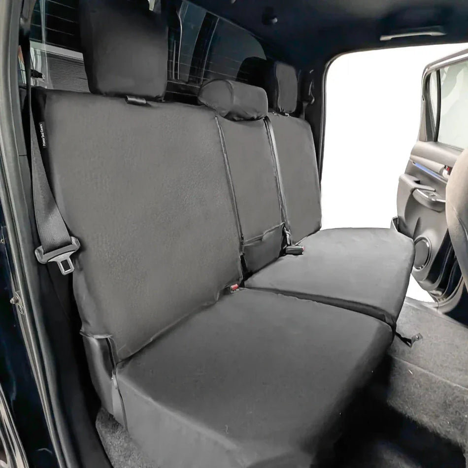Rear seat cover set with gray padded panels and headrest covers
