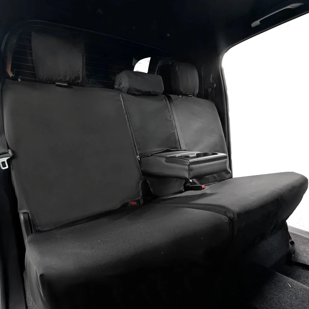 Rear seat cover set with gray padded backrests and fold-down armrest section