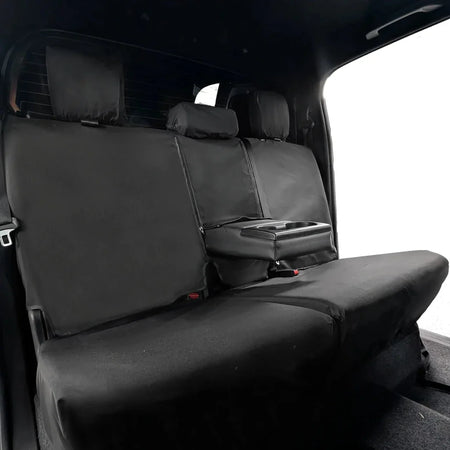 Rear seat cover set with gray padded backrests and fold-down armrest section