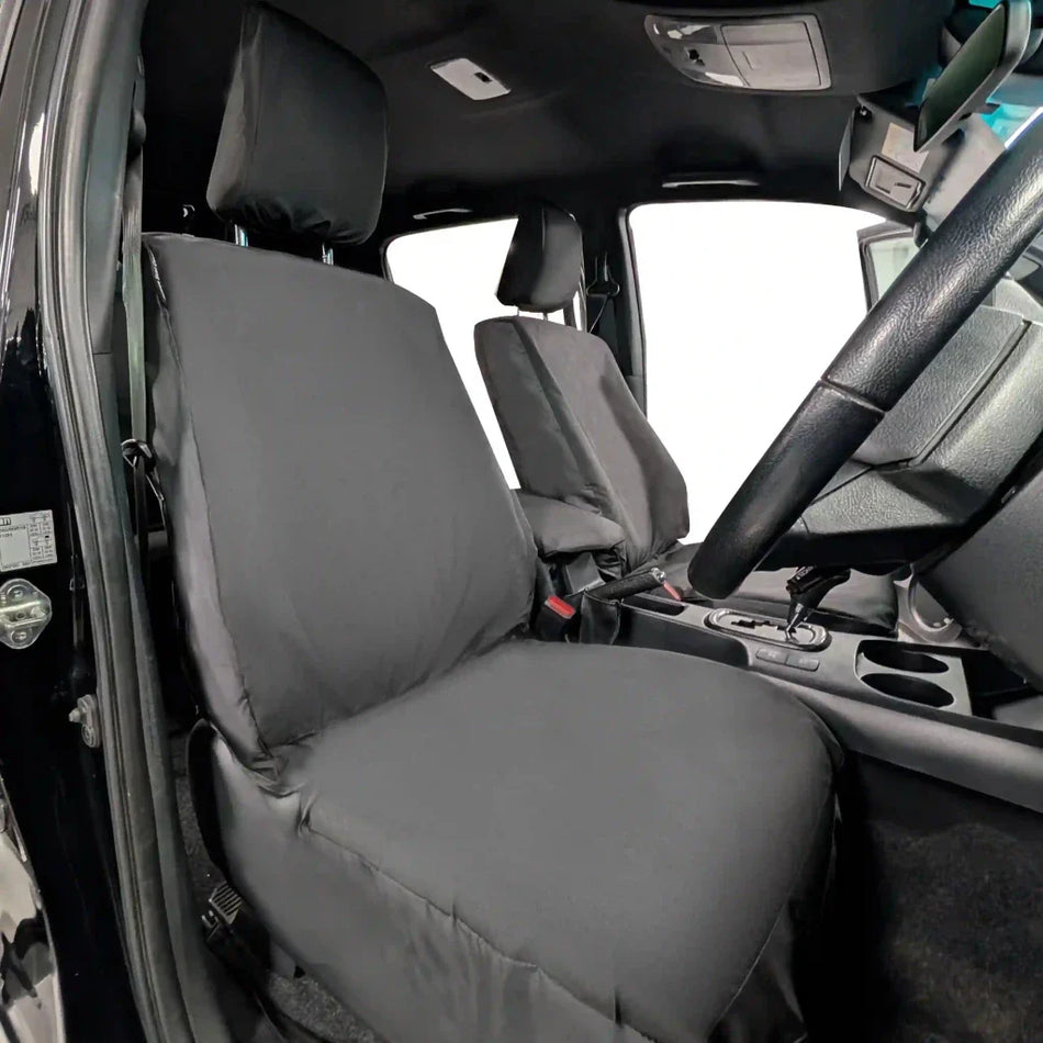 Front seat cover set: black padded covers with stitched seams and headrest openings